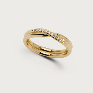 Crossed Viv ring: two crossed 14k gold bands with 9 brilliant cut diamonds set in the band