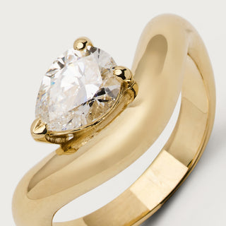 Wave pear solitaire ring