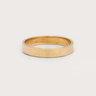 Gold band ring