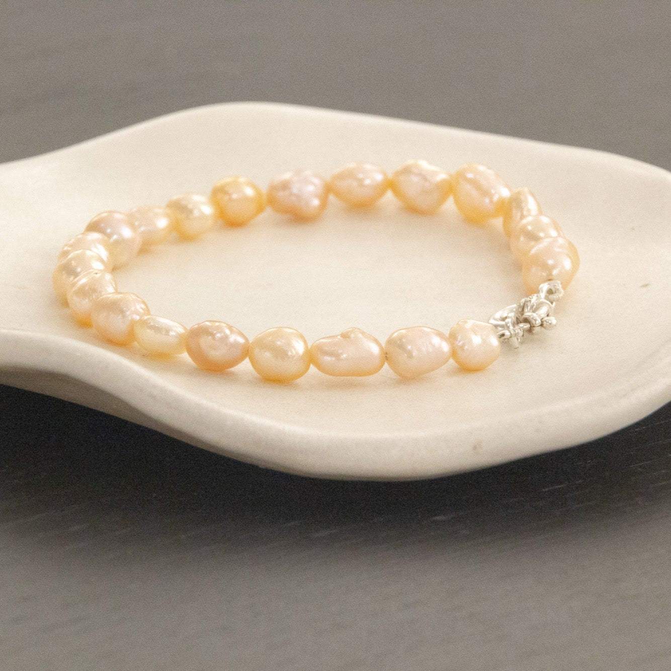 Peach pearl bracelet